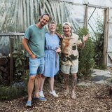The three podcast hosts in front of the greenhouse
