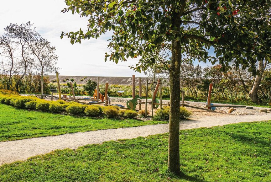 Balancierbalken mit Dino-Figuren